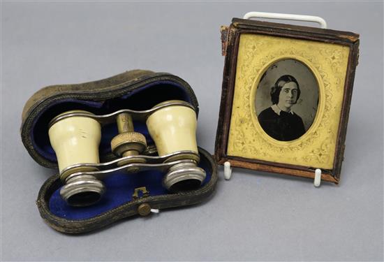 A daguerreotype and ivory opera glasses
